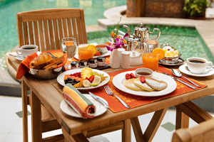 Breakfast by the pool at Forte Kochi